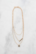 Luna layered necklace on marble