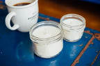 Classic soy candles styled with coffee