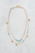 Soleil turquoise coin necklace on marble