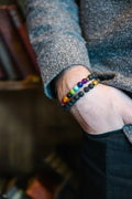 Seven Chakra lava stone bracelet on the wrist